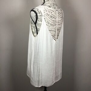 Cream with subtle pink pattern soft tank with back striated detail with plait S